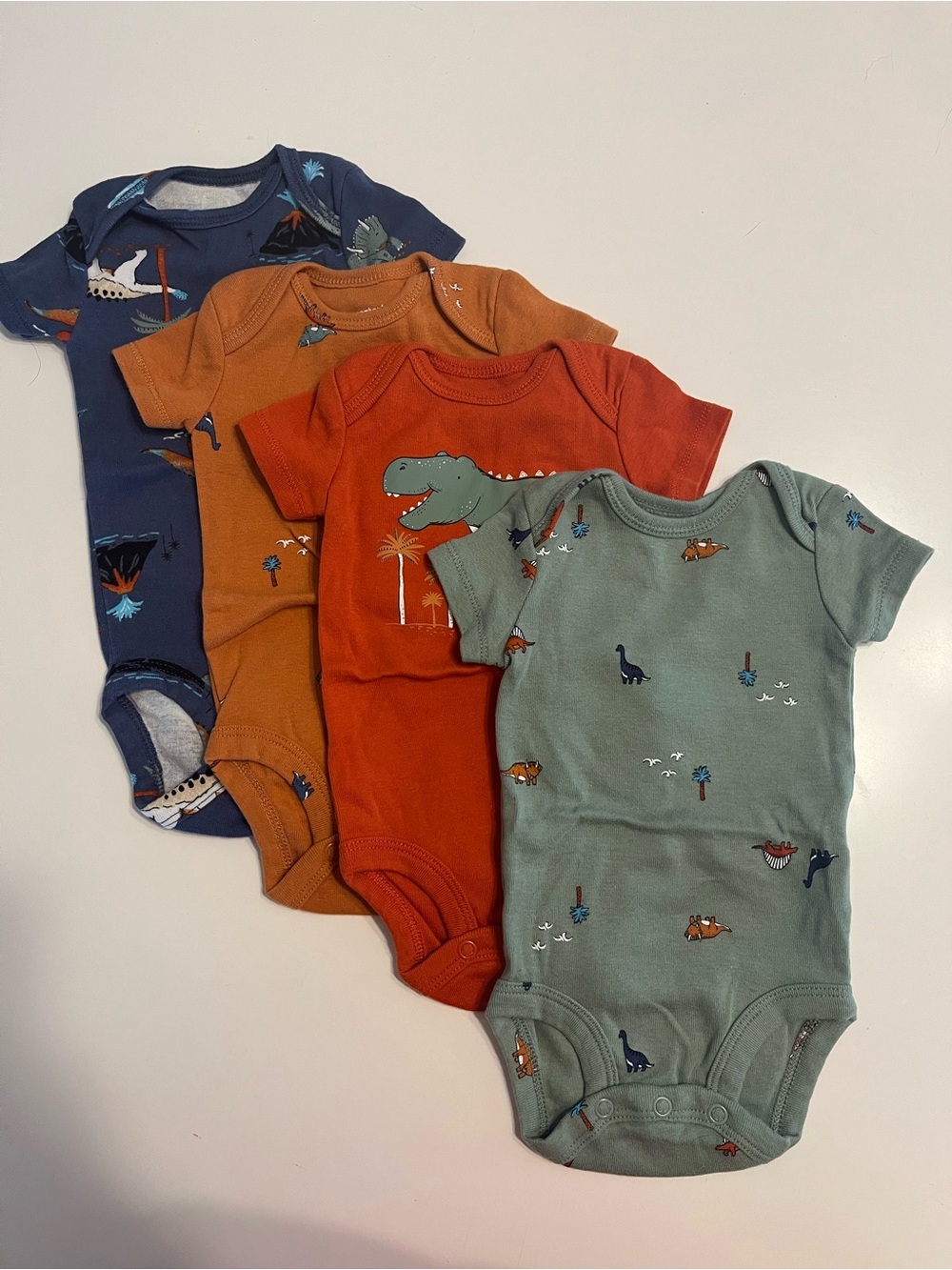 Carter’s dinosaur onesie set